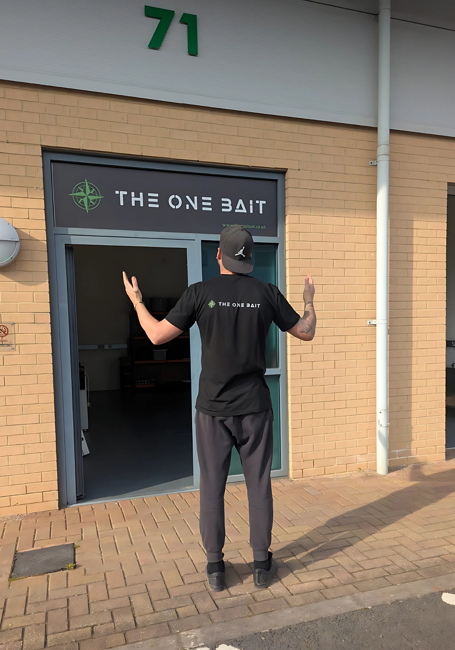 Dan, owner of the one bait in front of their shop.